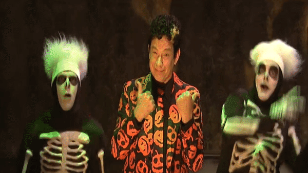 David S. Pumpkins dancing with two skeletons gif