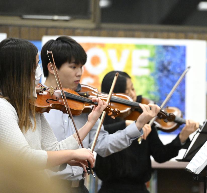 Violinists perform at the Enoch Pratt Free Library