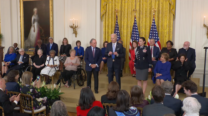 President Joe Biden prepares to give Michael Bloomberg the Presidential Medal of Freedom
