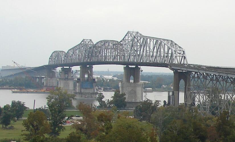 A large bridge is pictured from a distance