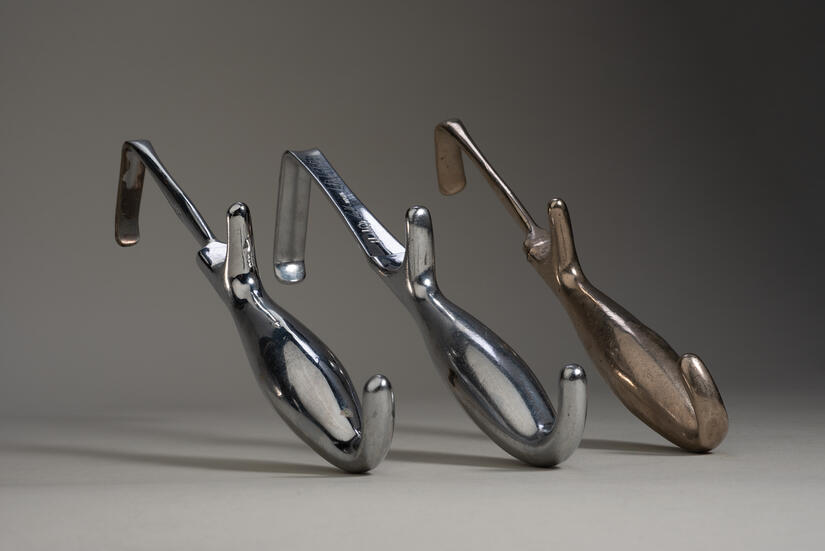 Three lateral surgical retractors in a row