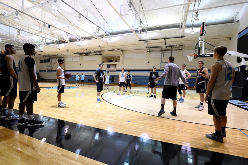 Men's basketball team plays a game