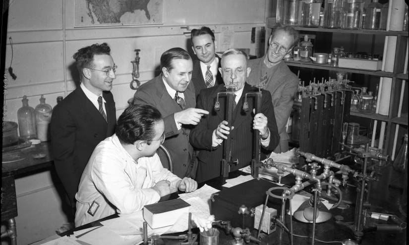 Warburg with colleagues in a laboratory