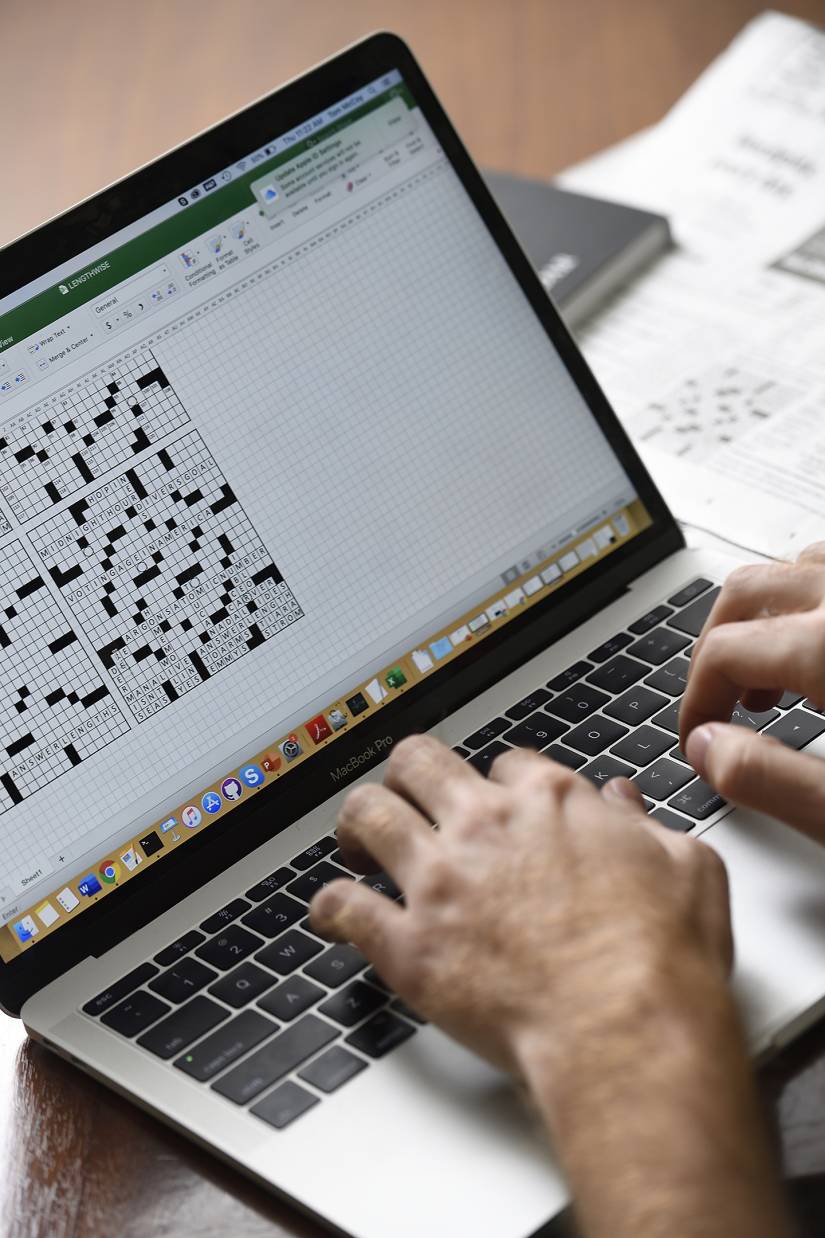 McCoy working on a draft crossword using Excel