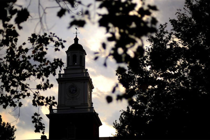 Gilman Hall tower silhouette at sunset