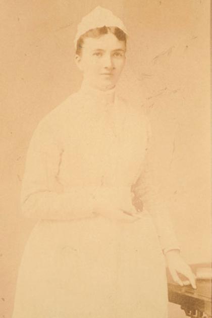 Black and white photo of Caroline Halsted in a nursing uniform