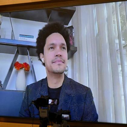 Trevor Noah appears on a Zoom virtual meeting