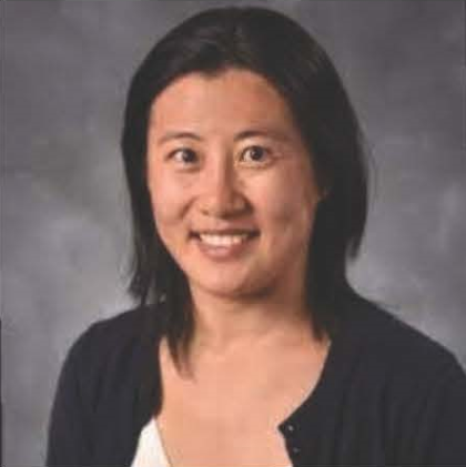 Head shot of Alison Xie, a woman of Asian heritage wearing professional dress