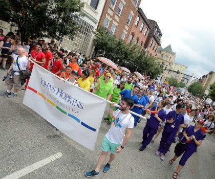 Photograph of the Johns Hopkins contingent in a Pride parade