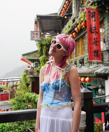 Sondra Rahmeh smiles for a photo in a village in Taiwan.