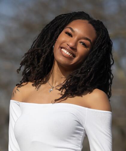 A professional headshot of Kayla Ingram.