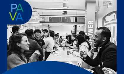 Black-and-white photo from Mix & Match Night with people engaging in conversation
