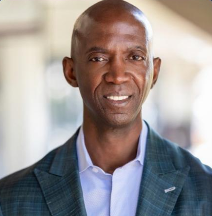 Head shot of Mike Edmondson, a black man in professional dress
