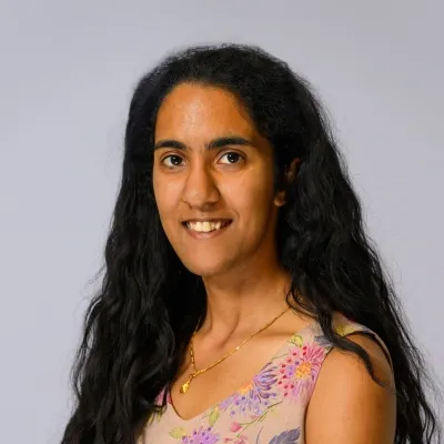 A professional headshot of Anagha Krishnan