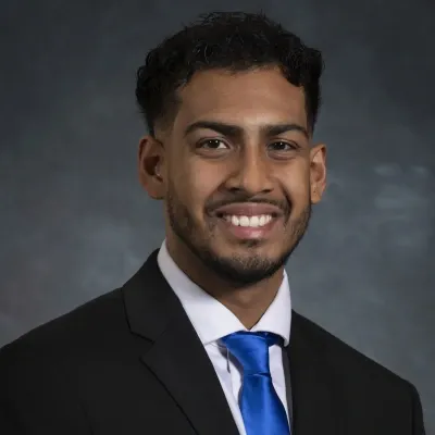 A professional headshot of Muhammad Omar Qadir