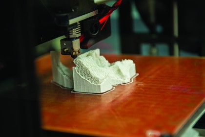 a 3-D printer creates a layer of a mandible