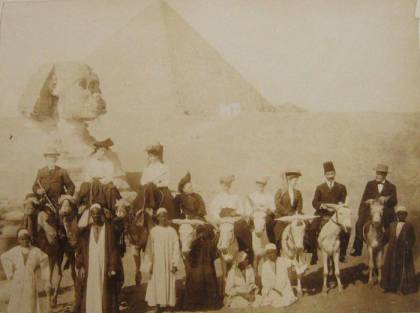 Aged photograph of men on horseback before the Sphinx