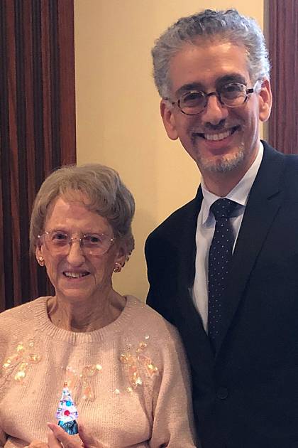 Jane Hixson and Josef Coresh, director of the Comstock Center, celebrate the holidays in 2019.