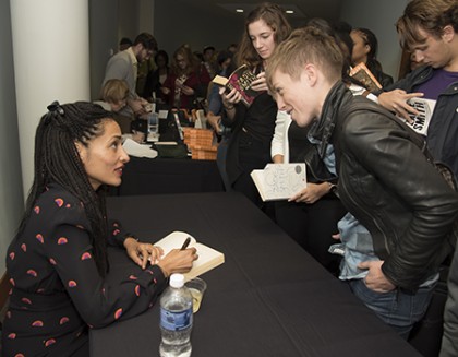 Author Zadie Smith signs a book at her reading on Homewood campus