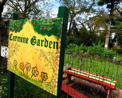 Carmine Garden sign