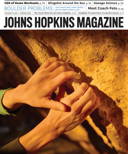 cover image of Johns Hopkins Magazine, featuring a closeup of the hands of climber Jessamy Taylor