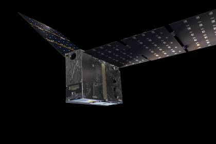 Illustration looks like a square, refigerator-shaped spacecraft with large solar panels resembling wings