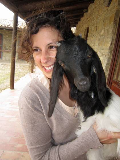 Jessica Fanzo hugs a goat