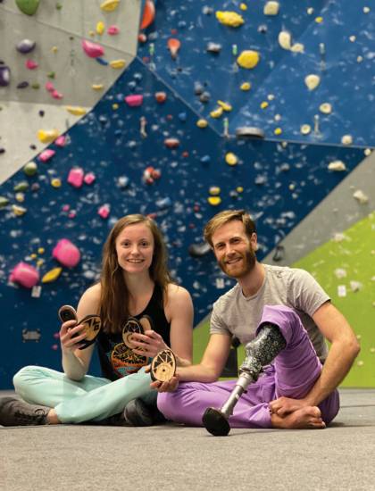 Jessamy Taylor and Jono Lewis at a climbing gym