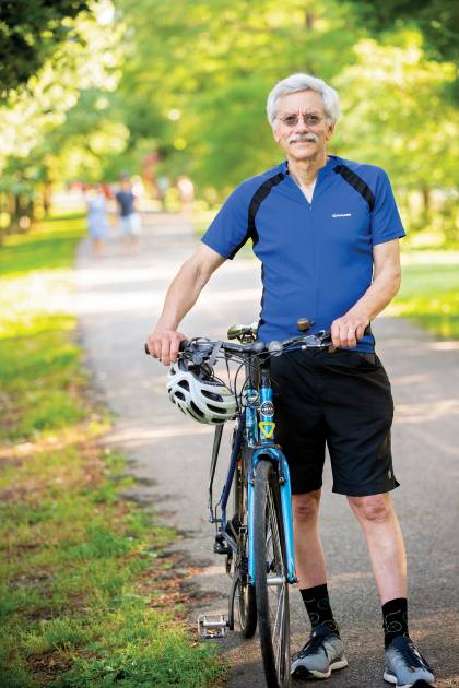 Peter Harnik stands next to his bike on the Washington & Old Dominion Trail. 