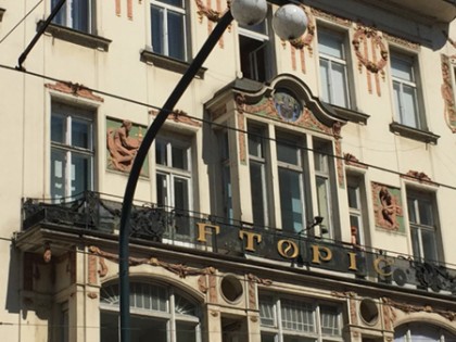 Exterior of an opulent building with ornamental carvings