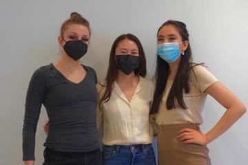 Photo of three masked women