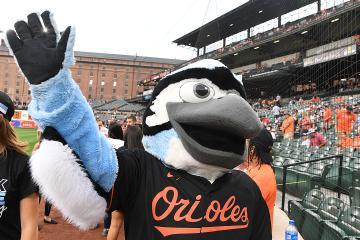 Blue Jay wavs to the crowd inside the ballpark