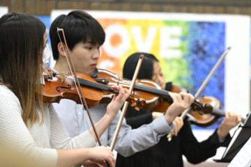 Violinists perform at the Enoch Pratt Free Library