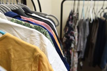 Racks of clothing in the Gender Affirming Closet