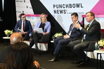 Punchbowl News senior congressional reporter Andrew Desiderio,  Punchbowl founder and CEO Anna Palmer, and Sens. and Todd Young (R-Ind.) and Mark Warner (D-Va.) 