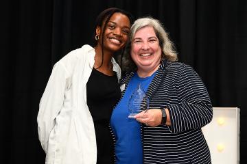 Laura Stott with Koye Oputa, the student who nominated her for the Supervisor of the Year award.