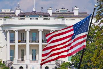 U.S. White House and American Flag