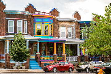 A row of colorful houses in the Abell neighborhood