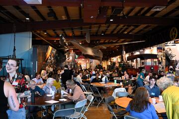 Local historians gather at Bmore Historic, a roomful of people excitedly sharing information