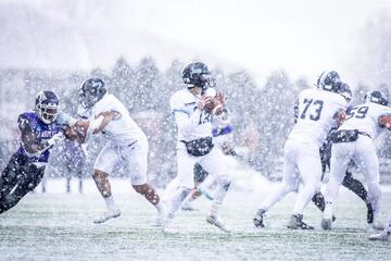 A football game in the snow