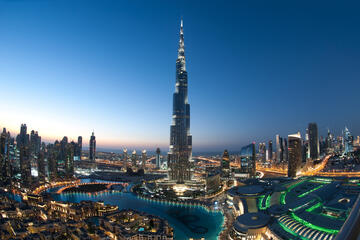 A photo of Dubai at sunset featuring the Burj Khalifa.