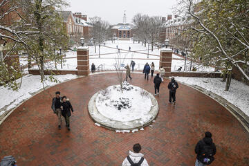 Students walk to class on a snowy day