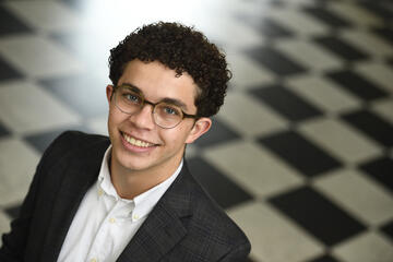 A professional headshot of Dalhart Dobbs.
