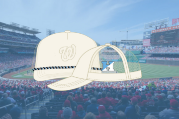 Image of a baseball-style hat overlaying Nationals park