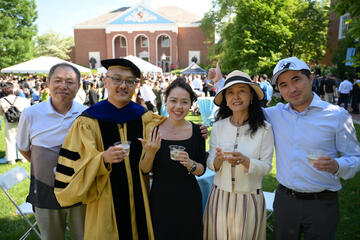 Jiawei Ge and Run Peng, with family