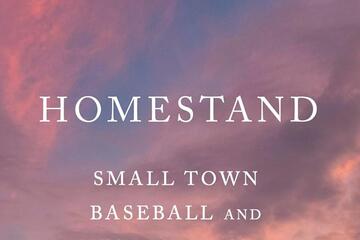 Detail of the book cover has the title 'Homestand' written on the pink clouds of a sunset