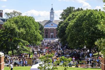 The Johns Hopkins Student Involvement Fair takes place in front of Shriver Hall on a sunny, late summer day.