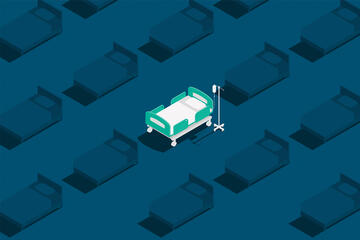 White hospital bed in a blue room with darker hospital beds surrounding it