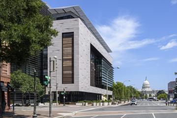 The Hopkins Bloomberg Center at 555 Pennsylvania Avenue in Washington, D.C. In the distance is the US Capitol Building.