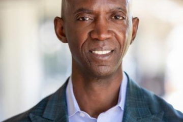 Head shot of Mike Edmondson, a black man in professional dress